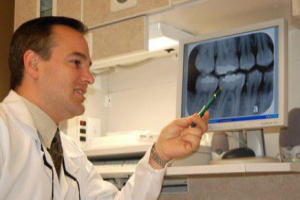 Dr.Pagniano-reviewing-dental-x-rays